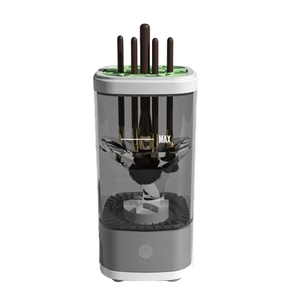Detail view of electric makeup brush cleaner with clear barrel and touch control button