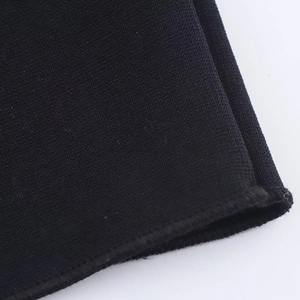 Detailed close-up of high-quality black knit fabric texture and durable stitching craft