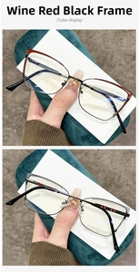 Macro detail of burgundy and black metal glasses frames with elegant red side accents