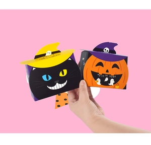 Detail of Halloween gift boxes featuring black cat and pumpkin with wizard hat lid