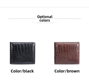 Close-up of black and brown crocodile textured leather bifold wallets for men