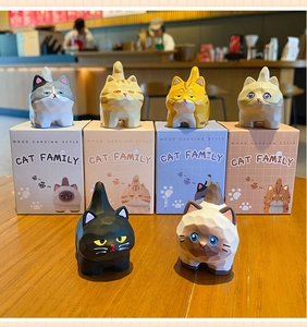Detailed set of six cartoon cat resin figures with wood carving style and gift boxes