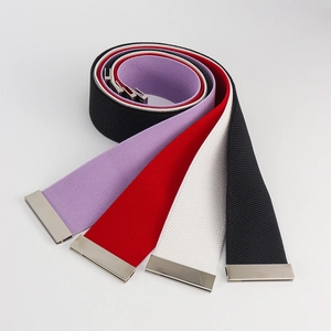 Elastic waist belts in red, white, purple and black with silver metal buckles for coats