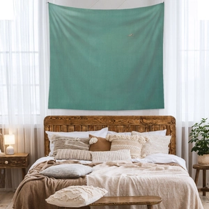 Detailed texture of turquoise bohemian woven wall hanging tapestry for bedroom decor