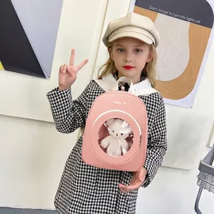 Pink cute bear backpack for toddler girls featuring a clear window with a plush bear