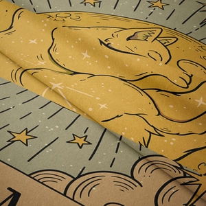 Macro detail of high-density woven tapestry showing a sleeping cat inside a crescent moon