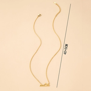 Detail of gold mountain peak pendant with adjustable 40 plus 5cm lobster clasp chain