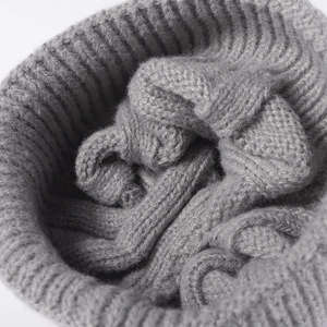 Chunky grey knit beanie for women featuring a thick ribbed weave for outdoor warmth
