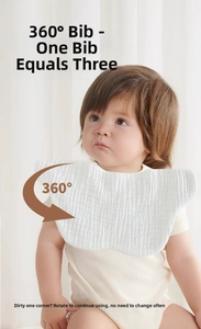 Detail of white 360-degree rotating petal-shaped cotton gauze baby bib with high absorption