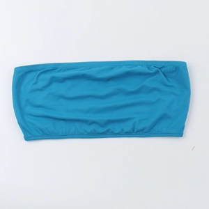Detailed view of the blue elastic knit fabric texture and strapless tube top structure