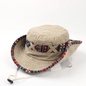 Detail of khaki cotton bucket hat with ethnic embroidery and adjustable chin strap