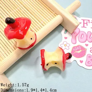 Detailed macro view of 1.9cm miniature resin apple core charm for DIY crafts and decor