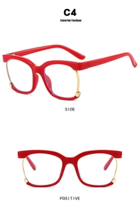 Detail of red square eyewear frame with gold metal lower rim accents and side view