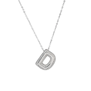 Silver iced-out bubble letter D pendant necklace with cubic zirconia on white background