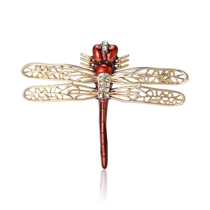 Fashionable red enamel dragonfly brooch with gold hollow wings and clear rhinestones