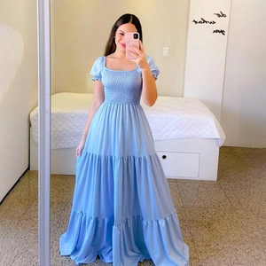 Light blue floral off-shoulder maxi dress with puff sleeves and ruffled tier skirt