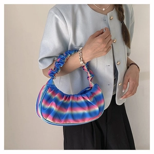 Pleated dumpling shoulder bag featuring a stylish blue and pink rainbow gradient design