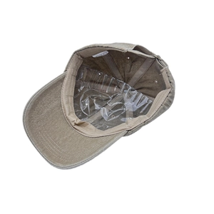 Khaki cotton baseball cap with embroidered palm tree, inside view showing cotton sweatband