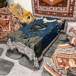 Bohemian knit camping blanket with mystic black snake and starry sky moon pattern
