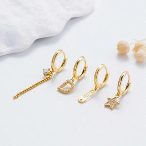 Gold hoop earrings set with star, pearl D-letter, and tassel charms for women