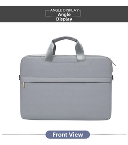 Front view of grey laptop sleeve with hidden zipper pocket and reinforced top handles