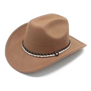 Detail of brown wool cowboy hat featuring a braided band with a white pearl button