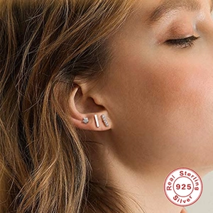 Three-piece S925 sterling silver earring set with star and pavé bar studs on model