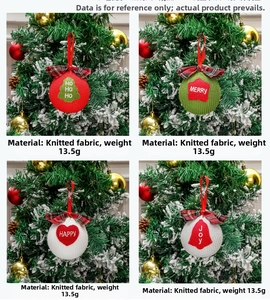 Close-up of knitted Christmas ornaments with embroidery and buffalo plaid bows on tree