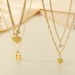 Golden double-layer stainless steel heart necklaces with Cuban chains and star pendants