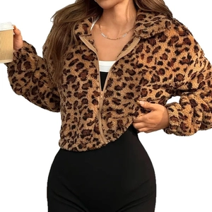 Detailed macro view of the soft leopard print faux fur texture and sturdy zipper closure