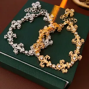 Vintage French iris bracelets in gold and silver finish with sparkling zircons