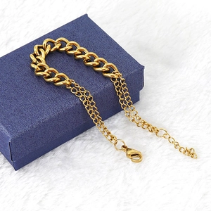 Bracelet chaîne épaisse en acier inoxydable doré 18 carats avec fermoir sur boîte à bijoux
