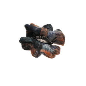 Elegant winter hair clip with multi-color knit bow design on a black plastic jaw clamp