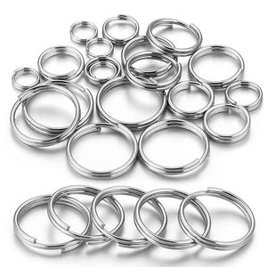 Set of multi-size stainless steel split rings for DIY jewelry and keychains on white