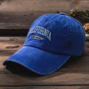 Detail of blue washed cotton baseball cap with California West Coast embroidery
