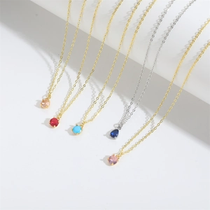 Minimalist round crystal pendant necklaces in various colors with gold and silver chains
