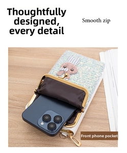 Detail of glitter crossbody bag showing the front phone pocket and smooth gold zipper