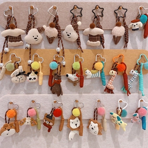 Detailed grid display of colorful plush animal keychains with woven nylon cords