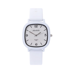 Close-up of white square quartz watch with grid texture dial and silicone strap
