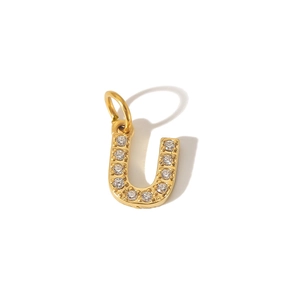 Macro shot of 18K gold plated letter J pendant with micro-set sparkling zircon stones