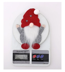 Lightweight 6.5g Christmas gnome cutlery holder made of red knit and plush fabric