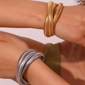 Three-layer wrap Tubogas spring bracelet in 18K gold and silver plated stainless steel