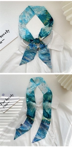 Artistic oil painting style narrow silk scarf shown tied in a bow on a white shirt