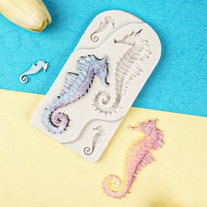 Three-cavity seahorse silicone mold for fondant and resin with finished colorful sea creatures