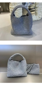 Detailed view of grey-blue woven denim tote bag with matching inner pouch set