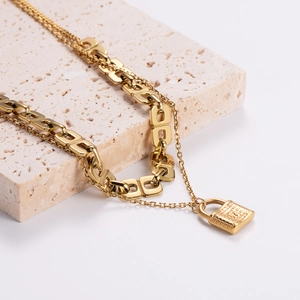 Gold double layer stainless steel necklace with geometric links and padlock pendant