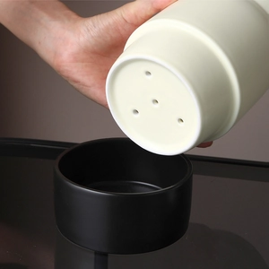 Dual-piece ceramic cutlery holder with white drain cylinder and black drip base tray