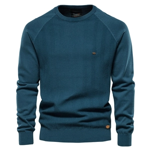 Men's dark teal crewneck knit sweater with herringbone texture on a white background