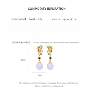 Detailed size and material information card for lotus zircon drop earrings in gold
