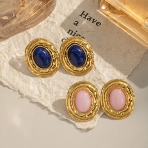 Vintage style oval lapis lazuli stud earrings with textured gold metal borders